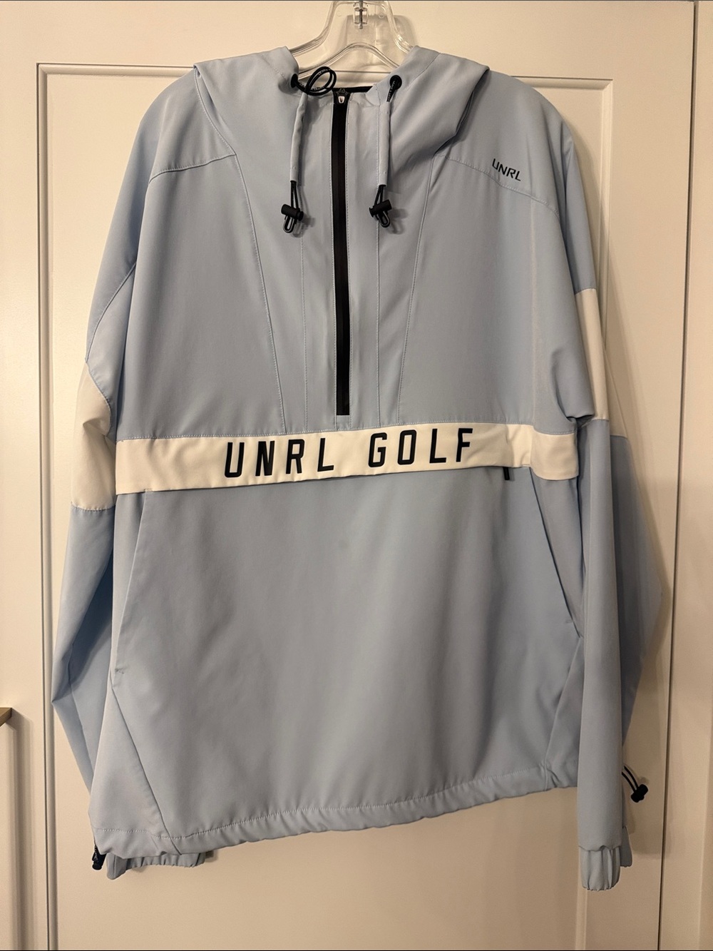 UNRL Golf Women’s Light Blue Hooded Windbreaker